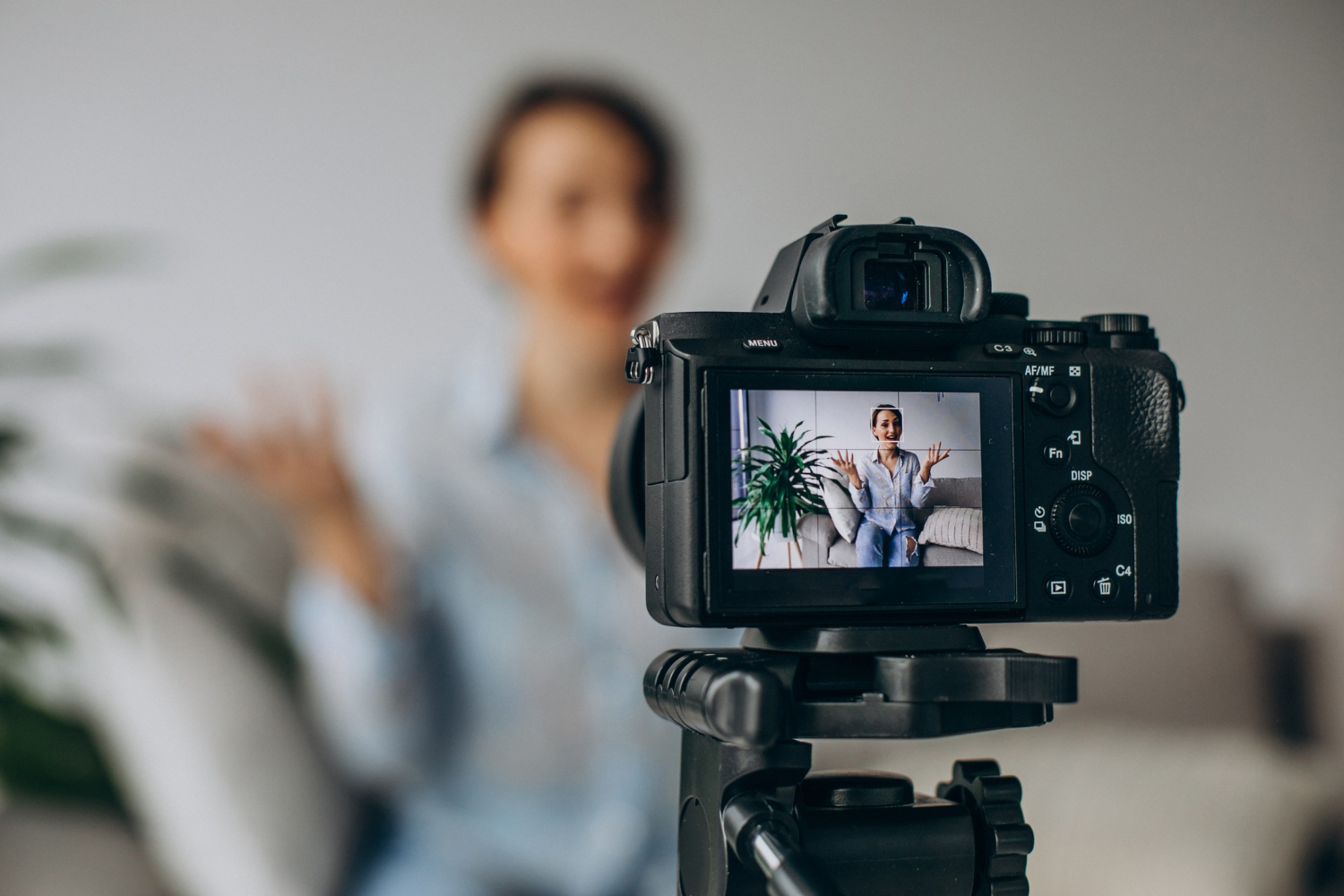 young-woman-blogger-recording-video-camera